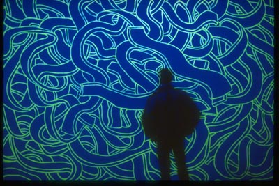 <i>Fancy Drawing </i>, 1998, wall drawing,  fluorescent paint, black light, overall: 9 x 12 feet (2.7 x 3.6 m)