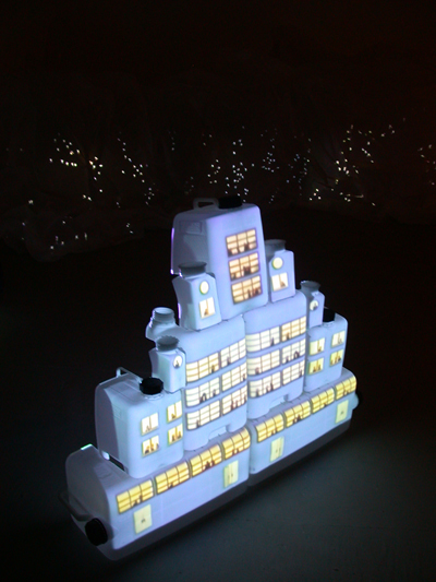 <i>Plastikcity</i>, 2005, video projection, plastic containers, rivets, steel, 39 1/2 x 46 x 9 1/4 inches (100.3 x 116.8 x 23.5 cm)