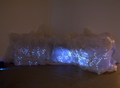 <i>Untitled (Plastic Mountain)</i>, 2006, video projection, plastic, wood, overall: 5 7/32 x 14 13/32 x 10 ft (1.58 x 4.37 x 3.05 m)