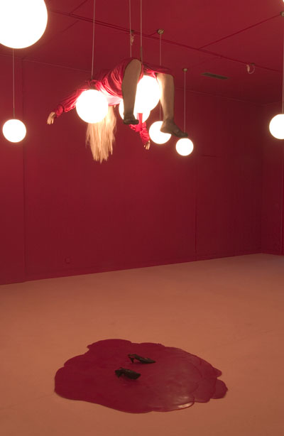 <i>Ecarlate</i>, 2004, installation with mannequin: resin, lamps, costume by Marion Hanania, music entitled Midnight The Stars and You by The Ray Noble Band & Al Bowly, mannequin: 30 1/2 x 59 x 30 1/2 inches (80 x 150 x 80 cm), installation: variable size, photo credit: Marc Dommage