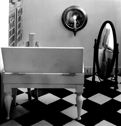 <i>Room Series: Untitled (Virginal and Mirror)</i>, 2004, silver gelatin print, 33.5x32 ins (85x81 cm)