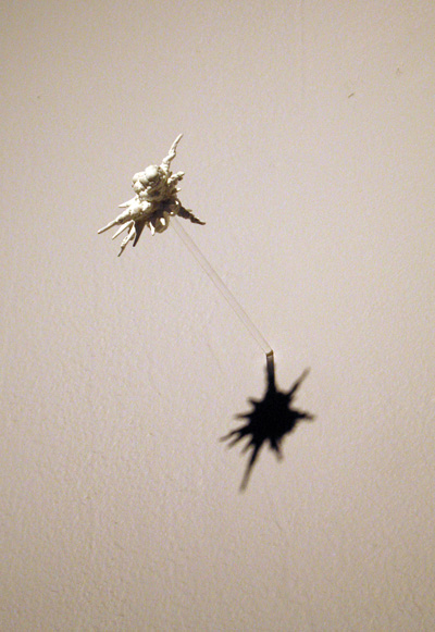 <i>Untitled (Big Bang 2)</i> [detail], 2006, cast resin, plexiglass, 1 inch diameter, edition 1 of 4